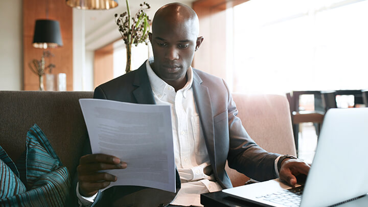 A businessman working on his laptop