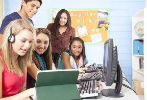 High School students in computer lab with teacher